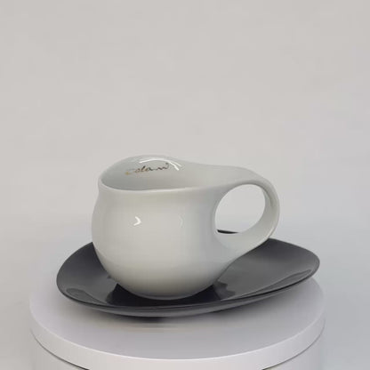 Luigi Colani Espresso Tasse mit Untertasse weiß/schwarz